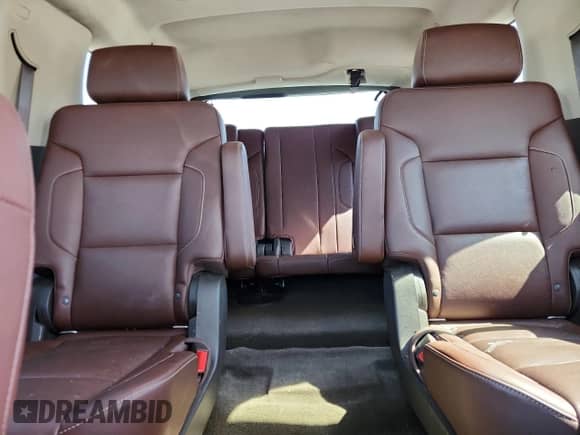 2016 Chevrolet Tahoe LTZ with VIN 1GNSKCKC8GR311975, listed as a Copart auction lot 69664515 with 129,583 mi miles and Salvage title. Bid and sale history available at DreamBid. Image 10.