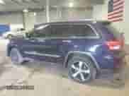 2012 Jeep Grand Cherokee Overland with VIN 1C4RJFCT4CC160396, listed as a Copart auction lot 71516165 with 135,574 mi miles and Salvage title. Bid and sale history available at DreamBid. Image 2.