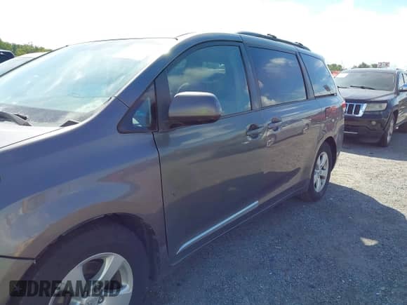 2011 Toyota Sienna LE AAS with VIN 5TDKK3DC8BS055000, listed as a IAAI auction lot 43107518 with 167,768 mi miles and . Bid and sale history available at DreamBid. Image 20.