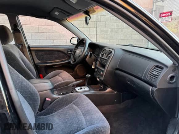 2004 Hyundai Sonata z VIN KMHWF25H94A000139, wystawiony jako Copart lot #42974655 z przebiegiem 129 267 mil mil oraz Czysty tytuł • Clean title. Historia ofert i sprzedaży dostępna na DreamBid. Obrazek 5.