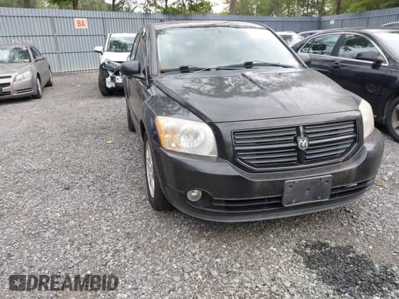 2009 Dodge Caliber SXT with VIN 1B3HB48A29D180283, listed as a IAAI auction lot 42875302 with 133,945 mi miles and . Bid and sale history available at DreamBid. Image 1.