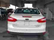 2014 Ford Focus Titanium with VIN 1FADP3J2XEL106711, listed as a IAAI auction lot 43371614 with 114,736 mi miles and . Bid and sale history available at DreamBid. Image 16.