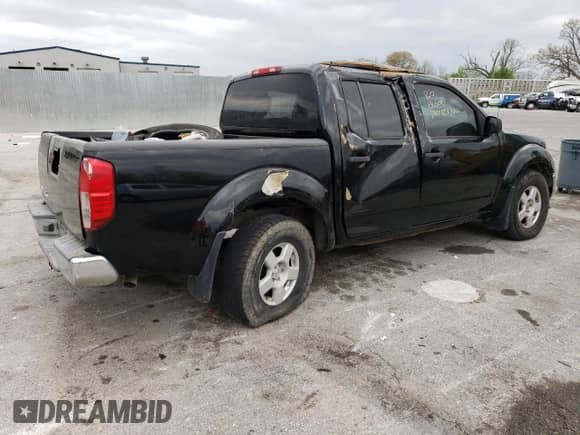 2005 Nissan Frontier SE with VIN 1N6AD07W45C438770, listed as a Copart auction lot 66035665 with 143,054 mi miles and Salvage title. Bid and sale history available at DreamBid. Image 3.