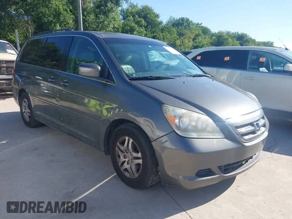 2007 Honda Odyssey EX-L z VIN 5FNRL38787B080046, wystawiony jako IAAI lot #42240227 z przebiegiem 138 073 mil mil oraz . Historia ofert i sprzedaży dostępna na DreamBid. Obrazek 1.