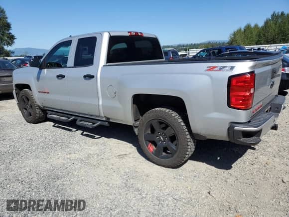 2017 Chevrolet Silverado 1500 LT with VIN 1GCVKREH2HZ352085, listed as a Copart auction lot 69423615 with 227,392 mi miles and Salvage title. Bid and sale history available at DreamBid. Image 2.