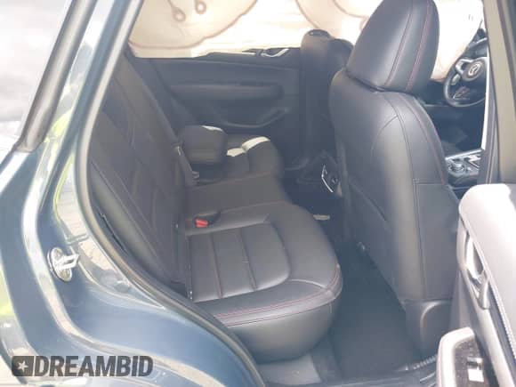 2023 Mazda CX-5 S Carbon Edition z VIN JM3KFBCM3P0262534, wystawiony jako IAAI lot #42740448 z przebiegiem 10 257 mil mil oraz . Historia ofert i sprzedaży dostępna na DreamBid. Obrazek 8.