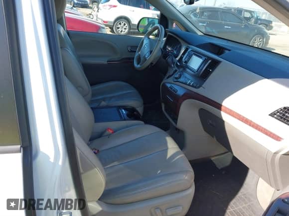 2013 Toyota Sienna XLE AAS with VIN 5TDYK3DC6DS372819, listed as a IAAI auction lot 41395777 with 181,526 mi miles and . Bid and sale history available at DreamBid. Image 5.