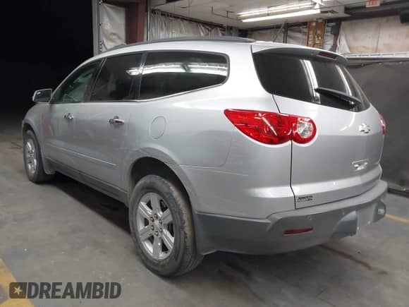 2012 Chevrolet Traverse 2LT with VIN 1GNKRJEDXCJ323302, listed as a IAAI auction lot 43100949 with 88,002 mi miles and . Bid and sale history available at DreamBid. Image 3.