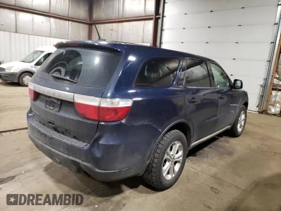 2012 Dodge Durango SXT with VIN 1C4RDJAG2CC267026, listed as a Copart auction lot 71364145 with 129,796 mi miles and Salvage title. Bid and sale history available at DreamBid. Image 3.