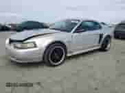 2001 Ford Mustang GT Deluxe с VIN 1FAFP42X81F229392, выставлен на аукционе Copart как лот 81474935 с пробегом 116 702 миль миль и Списание • Salvage title. История ставок и продаж доступна на DreamBid. Изображение 1.