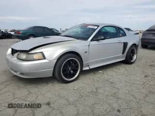 2001 Ford Mustang GT Deluxe с VIN 1FAFP42X81F229392, выставлен на аукционе Copart как лот 81474935 с пробегом 116 702 миль миль и Списание • Salvage title. История ставок и продаж доступна на DreamBid. Изображение 1.