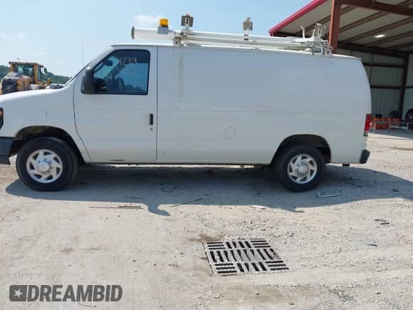 2012 Ford Econoline Cargo Commercial with VIN 1FTNE1EW0CDB13390, listed as a IAAI auction lot 42899058 with 119,855 mi miles and . Bid and sale history available at DreamBid. Image 14.
