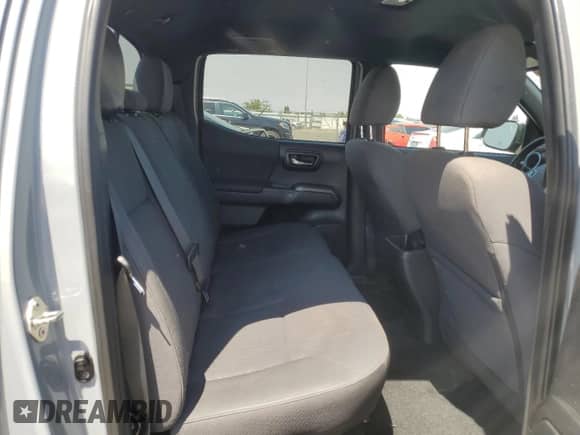 2018 Toyota Tacoma SR5 с VIN 3TMBZ5DN1JM013291, выставлен на аукционе Copart как лот 64250585 с пробегом 95 044 миль миль и Списание • Salvage title. История ставок и продаж доступна на DreamBid. Изображение 10.