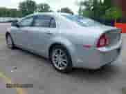 2012 Chevrolet Malibu LTZ 1LZ z VIN 1G1ZE5E09CF285242, wystawiony jako IAAI lot #42271615 z przebiegiem 137 255 mil mil oraz . Historia ofert i sprzedaży dostępna na DreamBid. Obrazek 3.