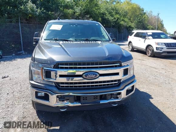 2019 Ford F-150 Lariat with VIN 1FTFW1E42KFB01390, listed as a IAAI auction lot 43126170 with 127,421 mi miles and . Bid and sale history available at DreamBid. Image 6.