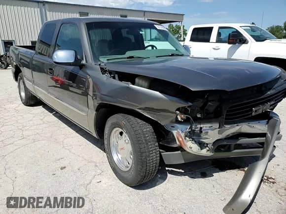 2000 GMC Sierra 1500 SLE with VIN 1GTEC19V3YZ352742, listed as a Copart auction lot 57746955 with 194,947 mi miles and Salvage title. Bid and sale history available at DreamBid. Image 13.