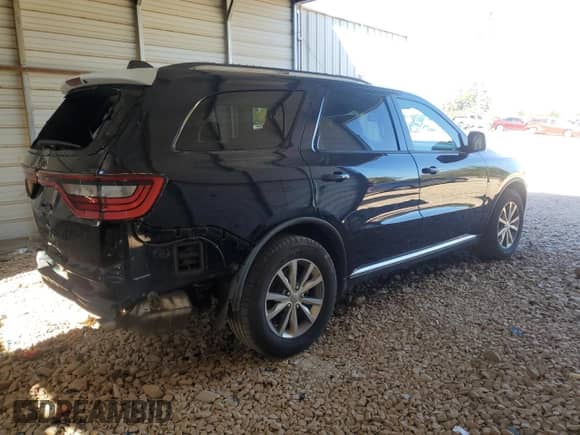 2014 Dodge Durango Limited with VIN 1C4RDHDG6EC489706, listed as a Copart auction lot 84872095 with 148,586 mi miles and Salvage title. Bid and sale history available at DreamBid. Image 3.