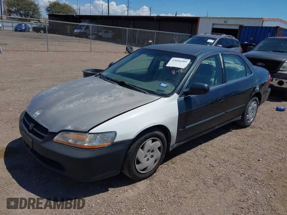 2000 Honda Accord LX with VIN 1HGCG1643YA030755, listed as a IAAI auction lot 43016205 with Not provided miles and . Bid and sale history available at DreamBid. Image 2.