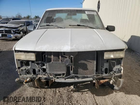 1999 Chevrolet Silverado 1500 with VIN 1GCEC19R2XR110722, listed as a Copart auction lot 82860594 with 326,724 mi miles and Salvage title. Bid and sale history available at DreamBid. Image 5.