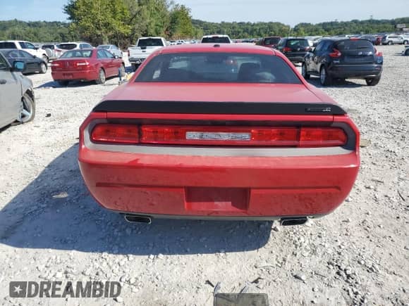2012 Dodge Challenger SXT z VIN 2C3CDYAGXCH176831, wystawiony jako Copart lot #70942105 z przebiegiem 156 131 mil mil oraz Szkoda całkowita • Salvage title. Historia ofert i sprzedaży dostępna na DreamBid. Obrazek 6.