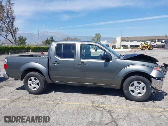 2006 Nissan Frontier LE with VIN 1N6AD07U66C453240, listed as a IAAI auction lot 41865566 with 118,762 mi miles and . Bid and sale history available at DreamBid. Image 13.