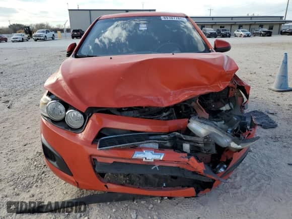 2012 Chevrolet Sonic LT z VIN 1G1JD6SHXC4125785, wystawiony jako Copart lot #89107785 z przebiegiem 118 059 mil mil oraz Szkoda całkowita • Salvage title. Historia ofert i sprzedaży dostępna na DreamBid. Obrazek 5.