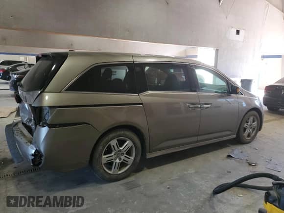 2012 Honda Odyssey Touring с VIN 5FNRL5H98CB078417, выставлен на аукционе Copart как лот 86089285 с пробегом 109 701 миль миль и Списание • Salvage title. История ставок и продаж доступна на DreamBid. Изображение 3.