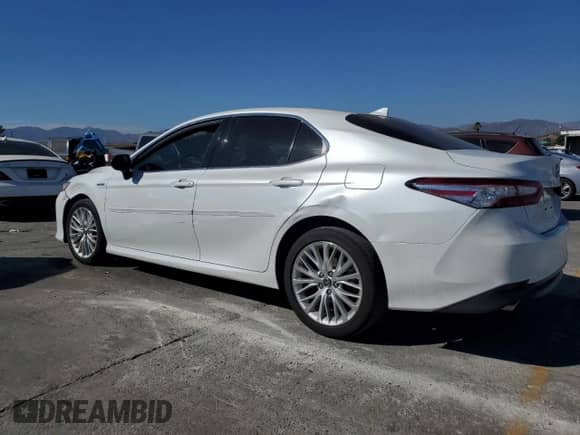 2019 Toyota Camry Hybrid LE с VIN 4T1B21HK2KU512669, выставлен на аукционе Copart как лот 67447715 с пробегом 141 772 миль миль и Списание • Salvage title. История ставок и продаж доступна на DreamBid. Изображение 2.