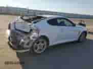 2006 Hyundai Tiburon GT z VIN KMHHN65F46U191990, wystawiony jako Copart lot #61887894 z przebiegiem 252 384 mil mil oraz Szkoda całkowita • Salvage title. Historia ofert i sprzedaży dostępna na DreamBid. Obrazek 3.