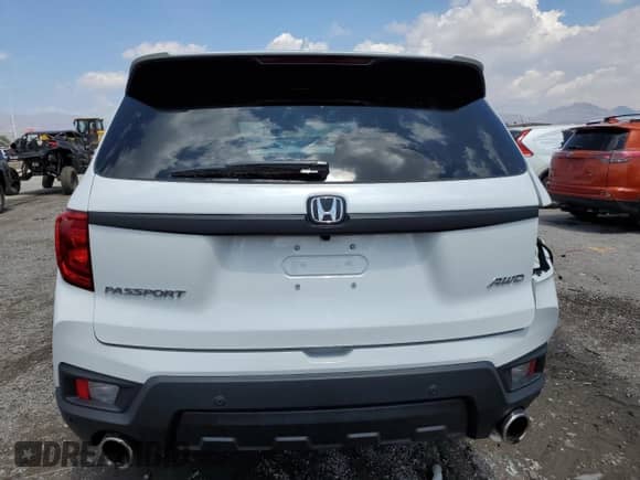2022 Honda Passport EX-L with VIN 5FNYF8H50NB027448, listed as a Copart auction lot 56055505 with Not provided miles and Salvage title. Bid and sale history available at DreamBid. Image 6.