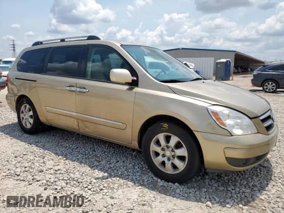 2007 Hyundai Entourage GLS with VIN KNDMC233376033298, listed as a Copart auction lot 68166895 with 154,725 mi miles and Salvage title. Bid and sale history available at DreamBid. Image 4.