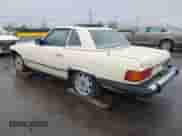 1983 Mercedes-Benz 380 SL with VIN WDBBA45A4DB026088, listed as a IAAI auction lot 41783726 with 239,227 mi miles and . Bid and sale history available at DreamBid. Image 3.