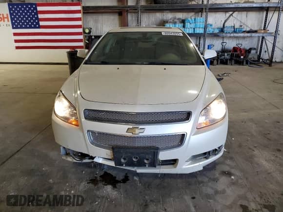 2012 Chevrolet Malibu LTZ with VIN 1G1ZG5E70CF182167, listed as a Copart auction lot 80943095 with 54,231 mi miles and Salvage title. Bid and sale history available at DreamBid. Image 5.
