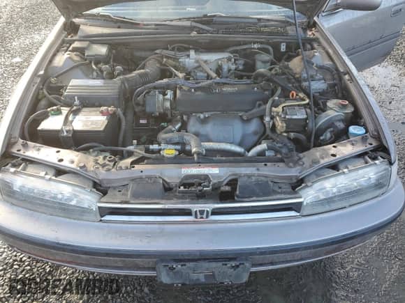 1992 Honda Accord LX z VIN JHMCB7651NC030132, wystawiony jako Copart lot #85348914 z przebiegiem 240 380 mil mil oraz Szkoda całkowita • Salvage title. Historia ofert i sprzedaży dostępna na DreamBid. Obrazek 12.
