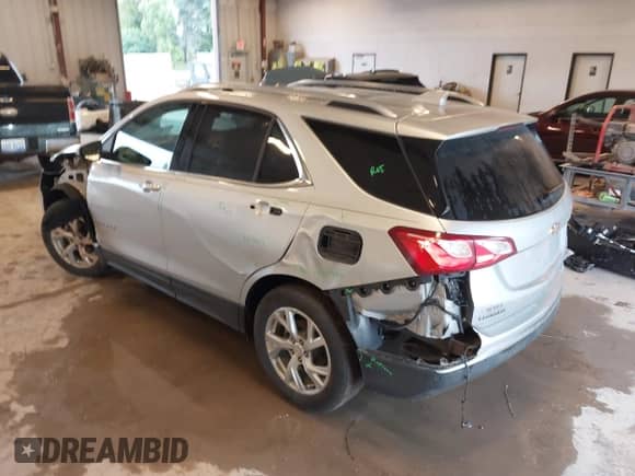 2021 Chevrolet Equinox Premier z VIN 3GNAXXEV8MS109583, wystawiony jako IAAI lot #43122552 z przebiegiem 88 070 mil mil oraz . Historia ofert i sprzedaży dostępna na DreamBid. Obrazek 3.