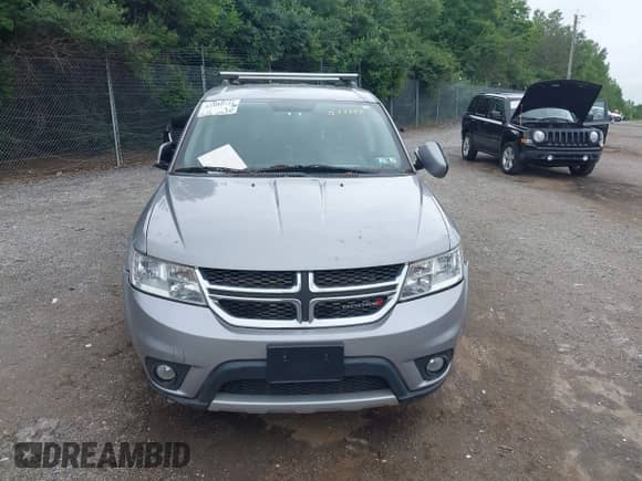 2017 Dodge Journey SXT with VIN 3C4PDDBG8HT577782, listed as a IAAI auction lot 42409731 with 136,618 mi miles and . Bid and sale history available at DreamBid. Image 12.