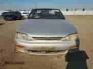 1995 Toyota Camry LE с VIN 4T1GK12E9SU100869, выставлен на аукционе Copart как лот 80628715 с пробегом 310 283 миль миль и Списание • Salvage title. История ставок и продаж доступна на DreamBid. Изображение 5.