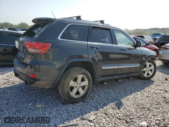 2011 Jeep Grand Cherokee 70th Anniversary z VIN 1J4RR4GT0BC632321, wystawiony jako Copart lot #66772334 z przebiegiem 203 708 mil mil oraz Szkoda całkowita • Salvage title. Historia ofert i sprzedaży dostępna na DreamBid. Obrazek 3.