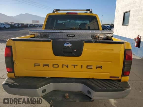 2001 Nissan Frontier SC SuperCharger z VIN 1N6MD27Y41C356817, wystawiony jako Copart lot #72874514 z przebiegiem 245 743 mil mil oraz Szkoda całkowita • Salvage title. Historia ofert i sprzedaży dostępna na DreamBid. Obrazek 6.