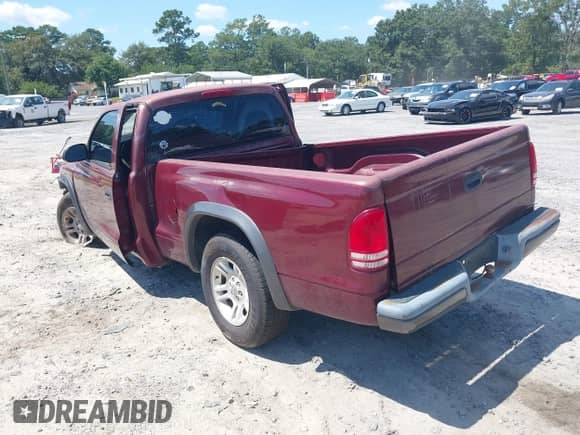 2002 Dodge Dakota with VIN 1B7FL16X92S720481, listed as a IAAI auction lot 43146237 with 128,588 mi miles and . Bid and sale history available at DreamBid. Image 3.