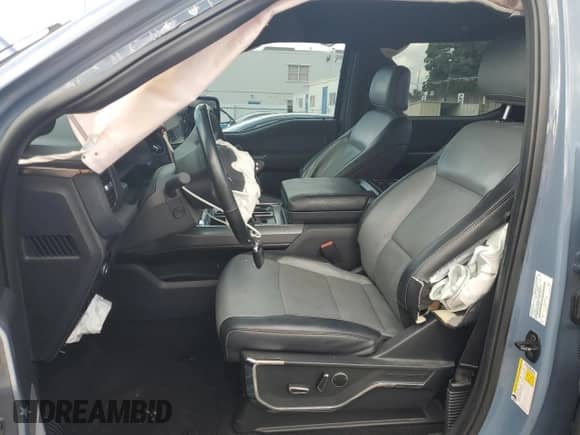 2023 Ford F-150 Lightning Pro with VIN 1FTVW1EV9PWG26295, listed as a Copart auction lot 80298305 with 43,492 mi miles and Salvage title. Bid and sale history available at DreamBid. Image 7.