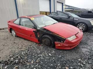 1995 Saturn SC с VIN 1G8ZF1289SZ397442, выставлен на аукционе Copart как лот 41957145 с пробегом 136 235 миль миль и Списание • Salvage title. История ставок и продаж доступна на DreamBid. Изображение 4.