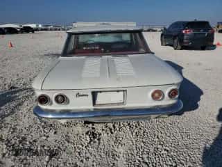 1964 Chevrolet Corvair z VIN 40969W266227, wystawiony jako Copart lot #74518234 z przebiegiem 58 606 mil mil oraz Czysty tytuł • Clean title. Historia ofert i sprzedaży dostępna na DreamBid. Obrazek 6.