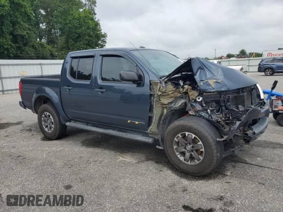 2017 Nissan Frontier Desert Runner with VIN 1N6DD0ER2HN704578, listed as a Copart auction lot 67485405 with 132,796 mi miles and Salvage title. Bid and sale history available at DreamBid. Image 4.