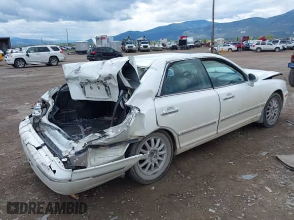 2005 Hyundai XG z VIN KMHFU45E85A418734, wystawiony jako IAAI lot #42312182 z przebiegiem 211 464 mil mil oraz . Historia ofert i sprzedaży dostępna na DreamBid. Obrazek 4.