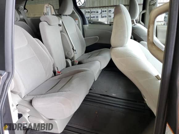 2015 Toyota Sienna LE AAS с VIN 5TDKK3DC8FS556605, выставлен на аукционе Copart как лот 41814185 с пробегом 186 294 миль миль и Списание • Salvage title. История ставок и продаж доступна на DreamBid. Изображение 11.