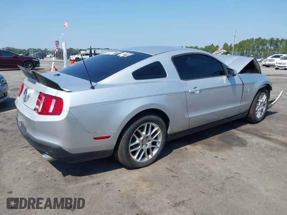 2012 Ford Mustang V6 with VIN 1ZVBP8AM7C5220275, listed as a IAAI auction lot 43152834 with 211,238 mi miles and . Bid and sale history available at DreamBid. Image 4.