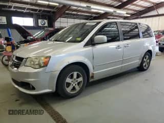 2012 Dodge Grand Caravan Crew with VIN 2C4RDGDG2CR121862, listed as a Copart auction lot 80859925 with 162,470 mi miles and Clean title. Bid and sale history available at DreamBid. Image 1.