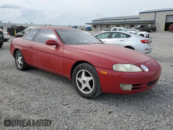 1996 Lexus SC 400 with VIN JT8CH32Y1T0051116, listed as a Copart auction lot 51518155 with 94,156 mi miles and Salvage title. Bid and sale history available at DreamBid. Image 4.