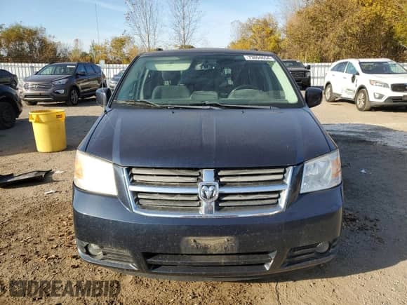 2009 Dodge Caravan with VIN 2D8HN44X39R672674, listed as a Copart auction lot 73094654 with 205,972 mi miles and Salvage title. Bid and sale history available at DreamBid. Image 5.